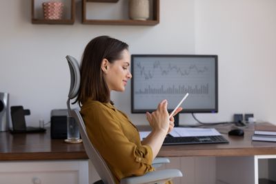 Woman monitoring email marketing statistics